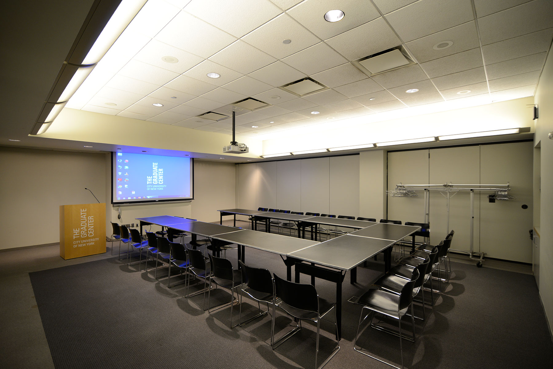9th Floor Conference Room Suite - Meeting Space in NYC. Room set up for a class or meeting - U-shaped desks.